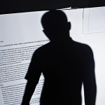**

> A blurred, distorted contract being signed, with a shadowy figure looming in the background, symbolizing coercion and lack of free will. Emphasize the uncertainty and vulnerability. Dark, dramatic lighting.

**
